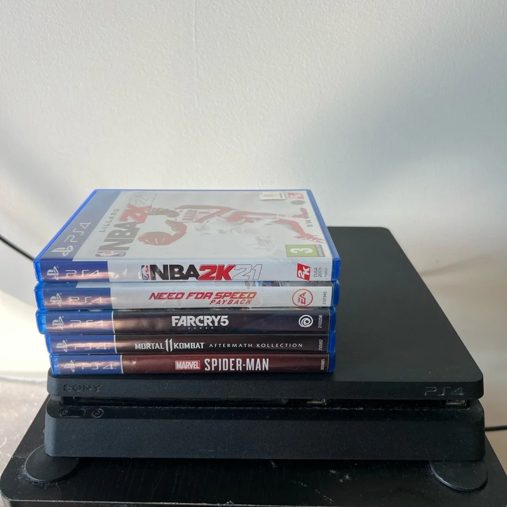 Sony PlayStation 4 Console with Game Collection - Black